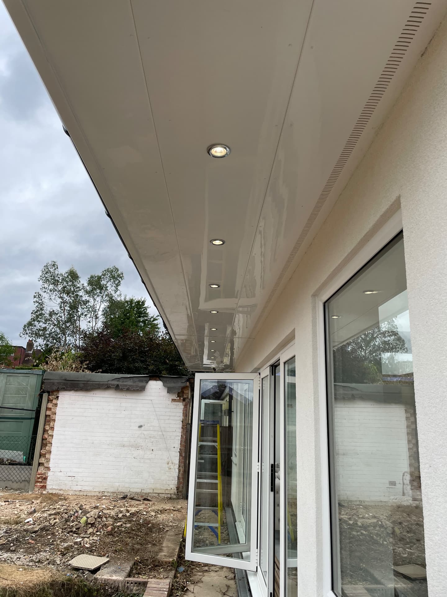 Completed exterior soffit lighting installation