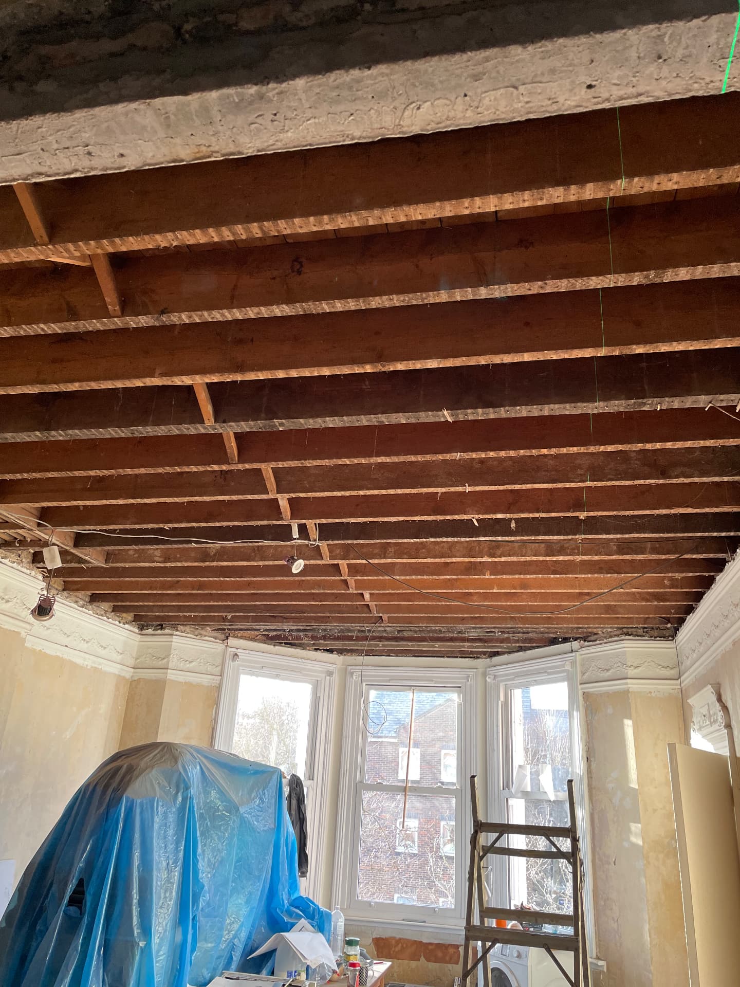 Electrical rewiring in progress during a property renovation